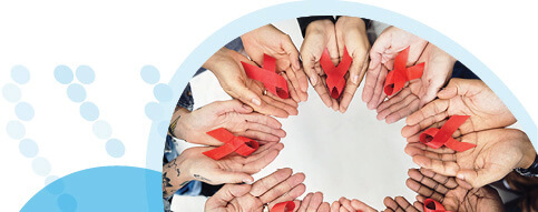 מעגל כפות ידיים שאוחזות סרט אדום למודעות למחלת האיידס
